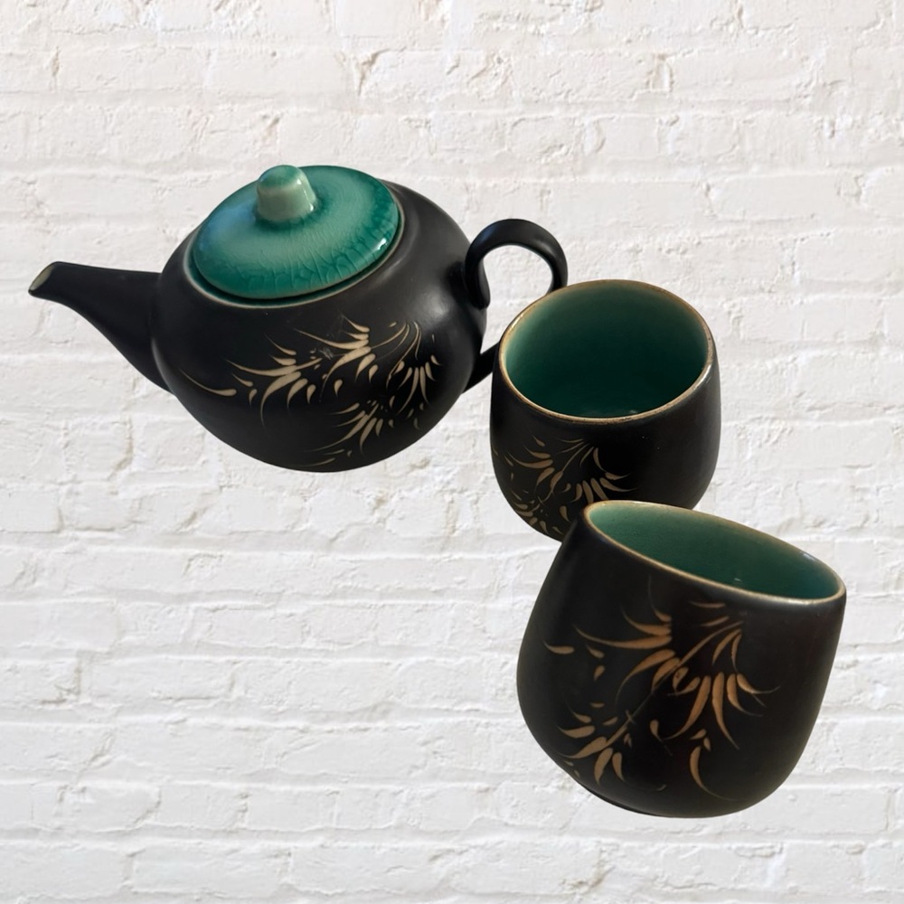 Carved Vietnamese tea kettle set with 2 small tea cups